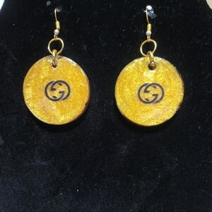 Gold-Tone Round Drop Earrings with Black Logo Accent